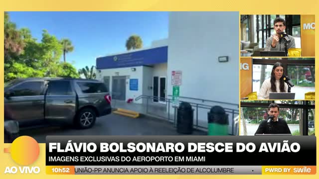 Flávio Bolsonaro sai de aeroporto em Miami coberto por guarda-chuvas